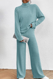 Ribbed knit turtleneck lounge set in aqua with wide leg pants.