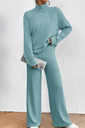 Ribbed knit turtleneck lounge set in aqua with wide leg pants.