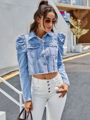 Light wash denim cropped jacket with puffed sleeves and raw hem