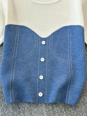 Color block knit t-shirt in white with blue denim-look bustier detail and white buttons.