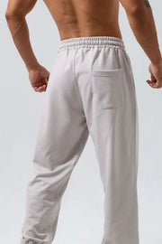 Gray joggers with elastic waistband and back pocket