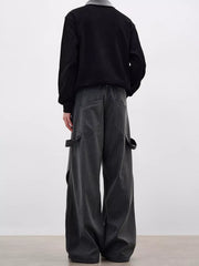 Men's gray pinstripe wide-leg sweatpants with cargo pockets and adjustable straps.