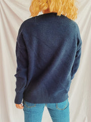 Indigo knit jumper with ribbed cuffs and hem, crew neck, long sleeves.
