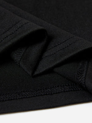 Black crew neck t-shirt with textured fabric and visible stitching detail.