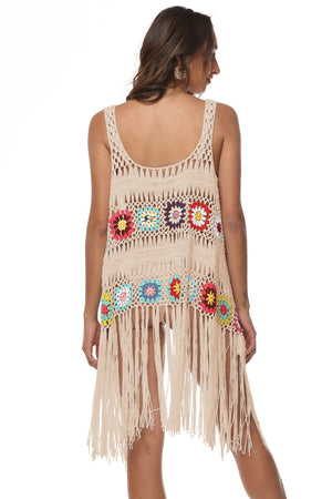 Apricot crochet vest with floral granny squares and fringe detail.