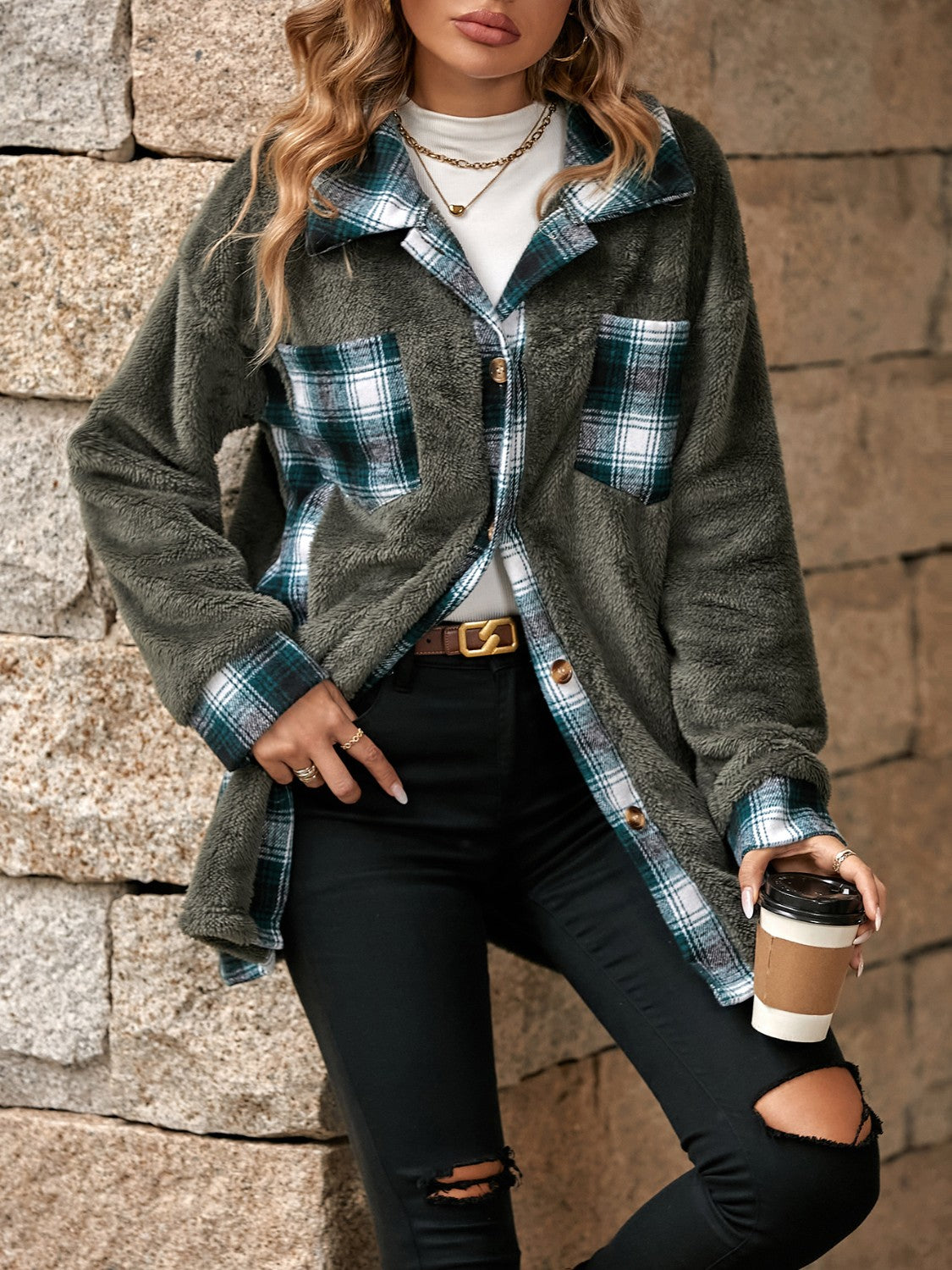 Teddy shacket with plaid collar and cuffs, featuring button front and chest pockets.