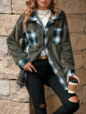 Teddy shacket with plaid collar and cuffs, featuring button front and chest pockets.