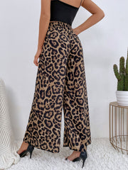 Leopard print palazzo trousers with an elastic waistband and wide legs.