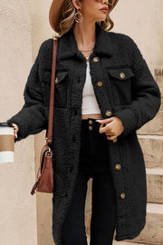 Black sherpa coat with corduroy patch pockets and button front.