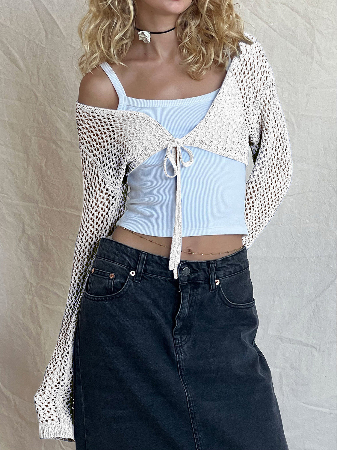 Crochet tie-front bolero shrug in black, white, or dusty blue acrylic.