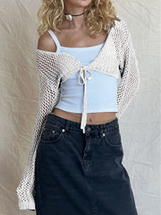 Crochet tie-front bolero shrug in black, white, or dusty blue acrylic.