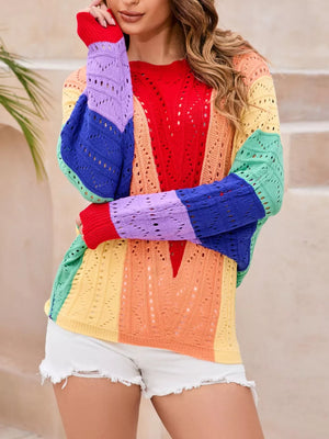 Vibrant color-blocked openwork knit sweater with a V-neck and long sleeves.