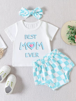 White graphic tee with "Best Mom Ever" text and blue gingham shorts set with matching headband.
