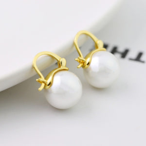 Gold plated pearl hoop earrings with lever back closure