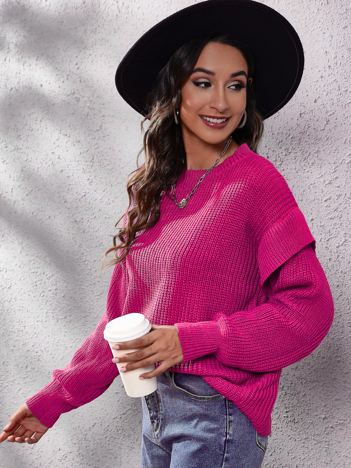 Cerise ruffled sleeve ribbed knit pullover sweater with crew neck.