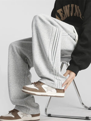 Gray sweatpants with pleated stripe detail on the side, loose fit, men's casual pants.