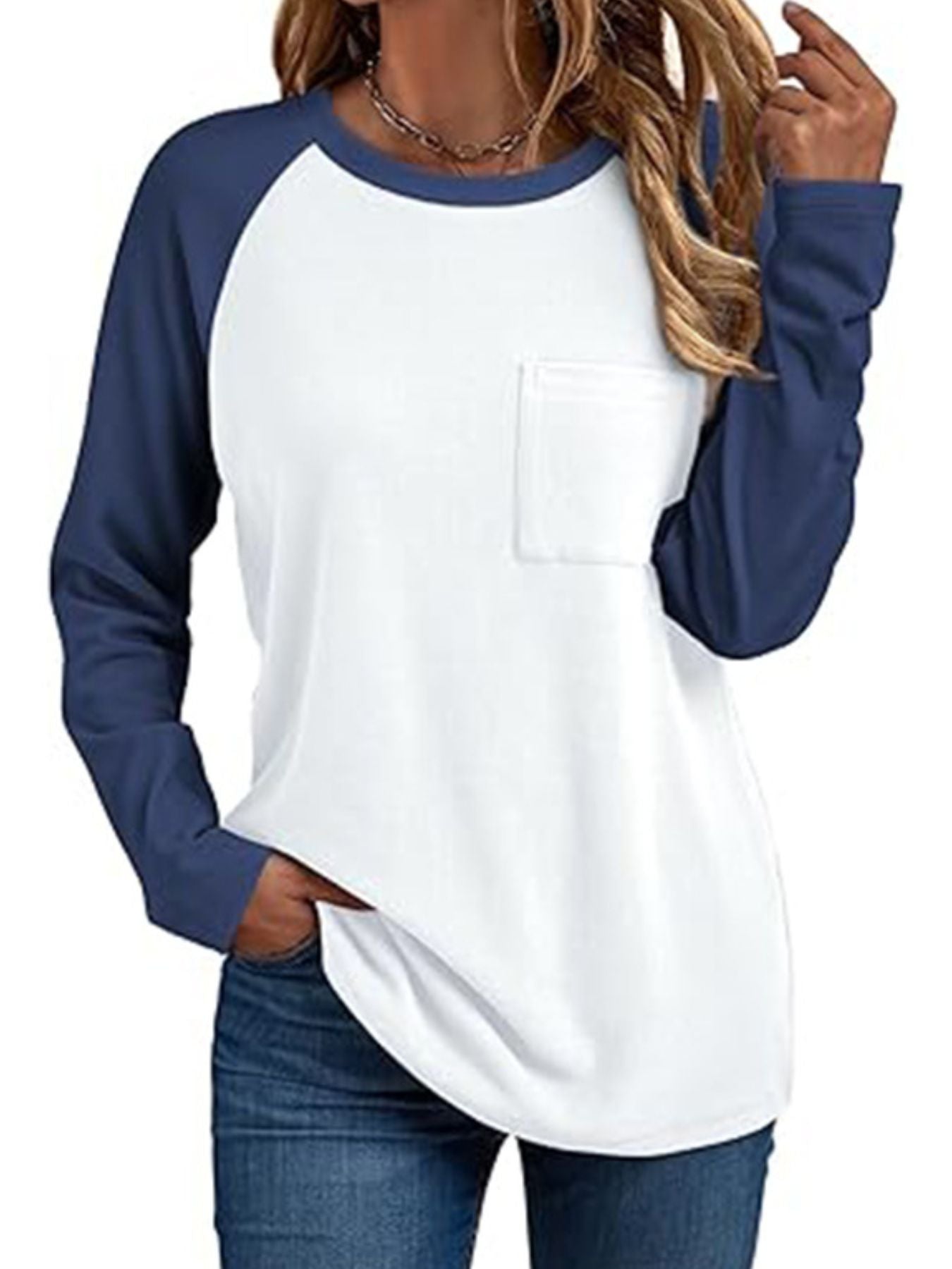 White and dark blue raglan long sleeve t-shirt with round neck and chest pocket.