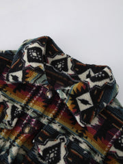 Southwestern sherpa button-up jacket with multicolor geometric pattern and button details.
