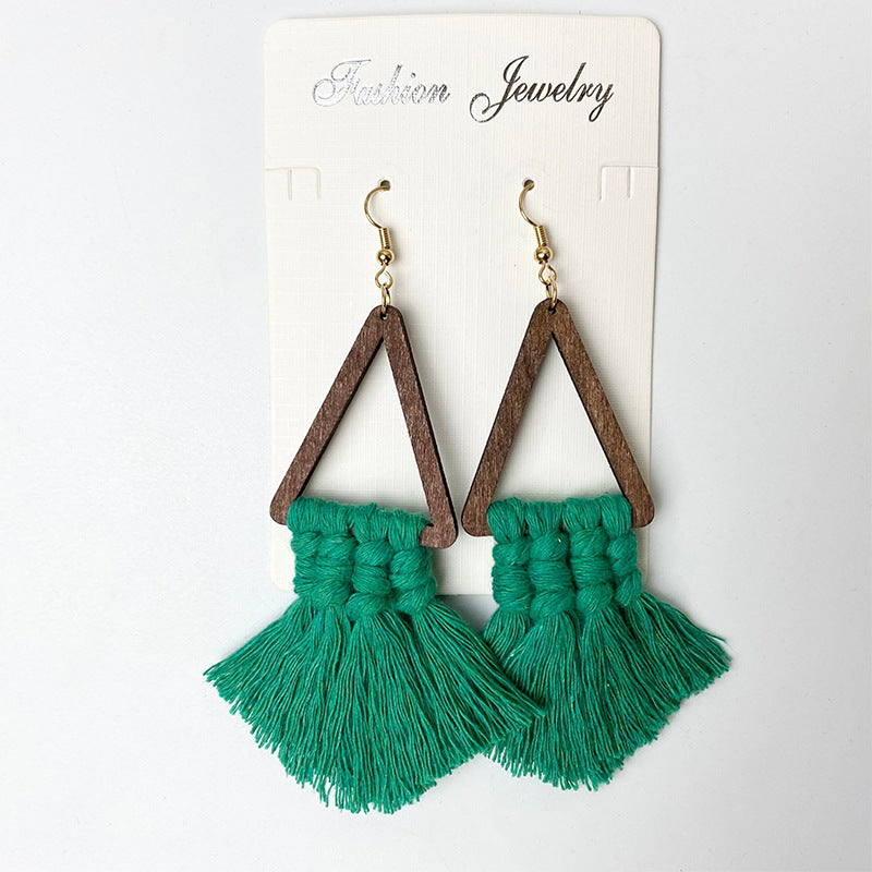Macrame triangle tassel earrings in green with wooden frames and gold hooks.