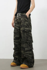 Wide-leg camo cargo pants with drawstring waist and multiple pockets.