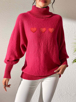 Deep Red turtleneck sweater with balloon sleeves and three heart appliqués.