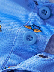 Blue toddler polo shirt with excavator print and blue buttons.