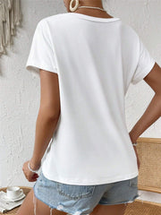 White draped knot front t-shirt with short sleeves and a casual cut.