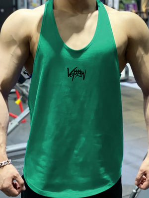 Green performance racerback tank top with black graphic detail on chest
