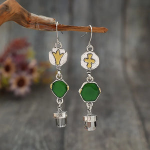Geometric emerald drop earrings with silver alloy and crystal accents.