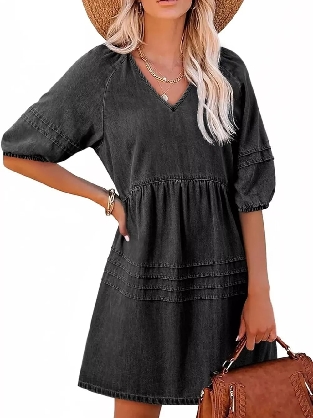 Denim mini dress with V-neck, puff sleeves, tiered skirt, and ruffled details.