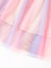 Toddler ballet tulle dress with pastel rainbow ombre and tiered skirt detail.