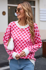 Heart grid crewneck knit sweater in hot pink and deep red acrylic with white trim.