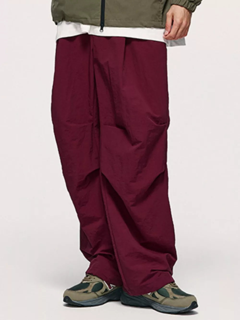 Wine red cargo joggers with drawstring waist and relaxed fit.