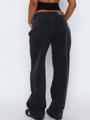 Dark gray wide-leg denim jeans with contrast stitching and a buttoned fly.