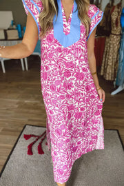 Vibrant floral midi dress with ruffle sleeves, V-neck, and blue trim.
