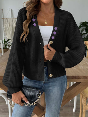 Black balloon sleeve cardigan with floral embellishments and button front.