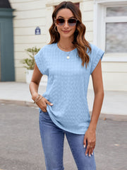 Light blue textured cap-sleeve tee with subtle knit fabric and crew neck.