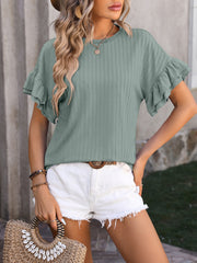 Sage green ribbed knit blouse with flutter sleeves and crewneck.