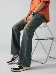 Men's wide-leg jeans in dark blue with vintage wash and relaxed fit.