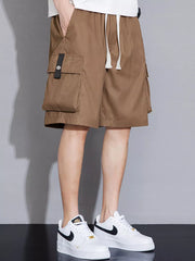Brown cargo shorts with drawstring waist and multiple pockets.