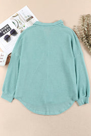 Light Green waffle knit button-down shirt jacket with collar and long sleeves.