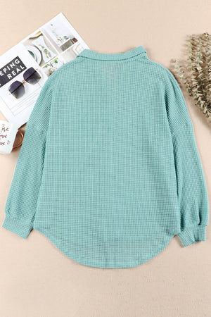 Light Green waffle knit button-down shirt jacket with collar and long sleeves.