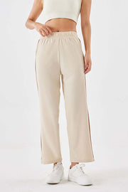 Side stripe relaxed trousers in camel with a comfortable elastic waistband and wide leg.