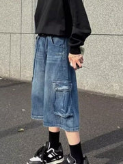 Men's loose fit blue denim cargo shorts with multiple pockets.