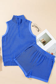 Royal blue ribbed sleeveless polo top with quarter zip and matching shorts set
