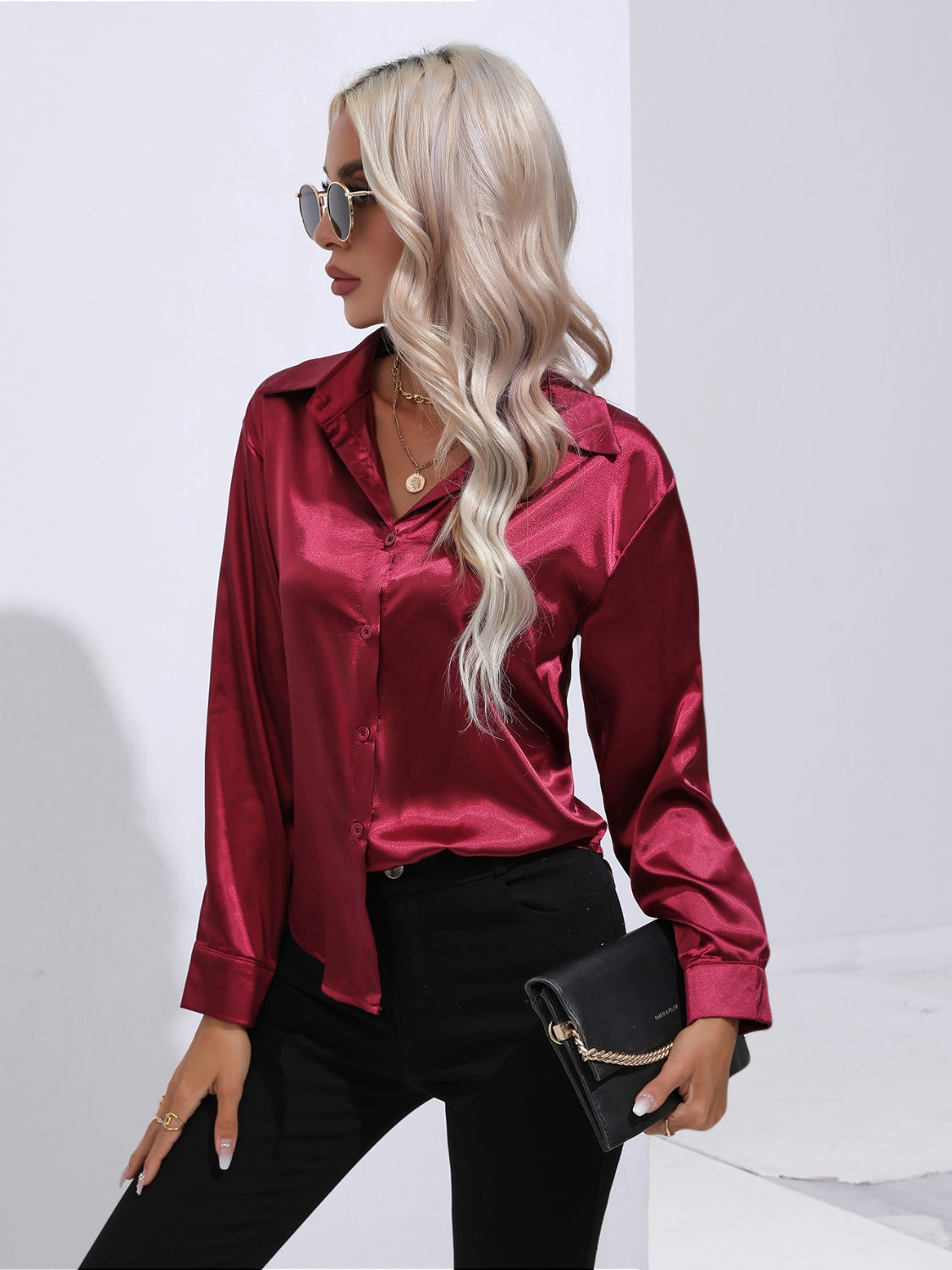 Burgundy satin tie-front blouse with buttoned front and collar.