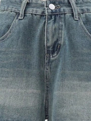 Men's blue denim cargo shorts with faded wash and button fly detail.