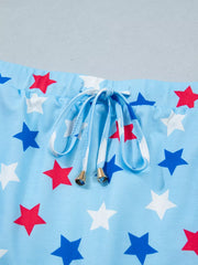 Light blue drawstring skort with white, red, and blue stars and gold-tipped drawstrings.