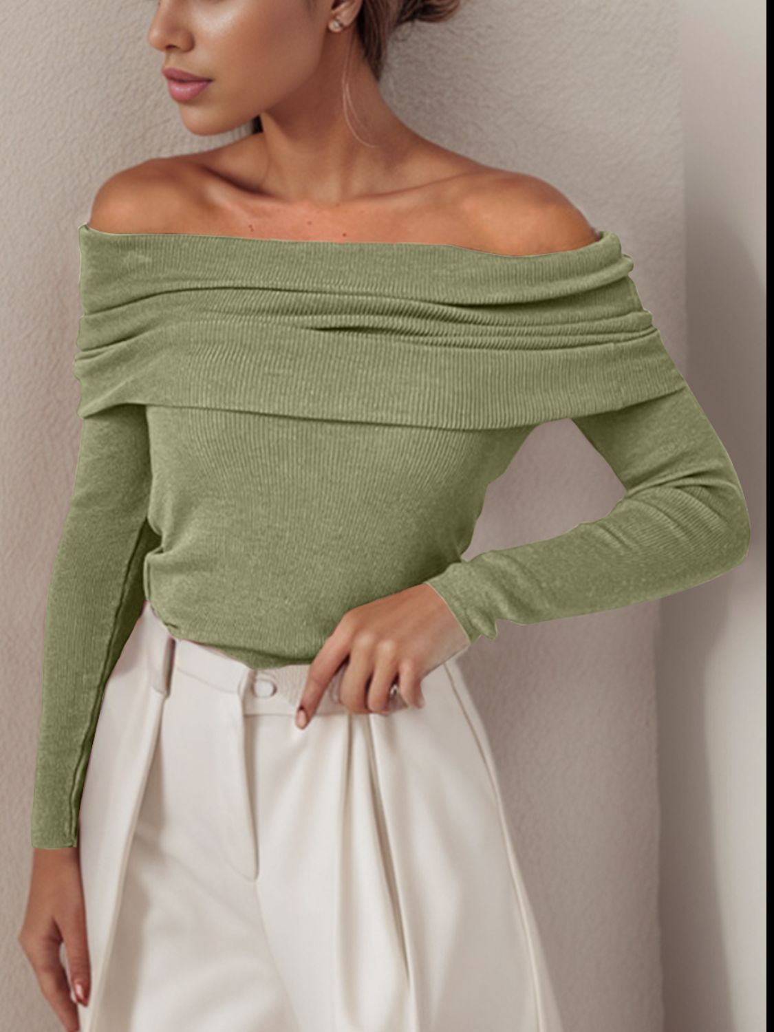 Sage knit off the shoulder sweater with long sleeves and draped neckline.