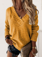 Yellow ribbed trim v-neck knit sweater with cuffed sleeves.